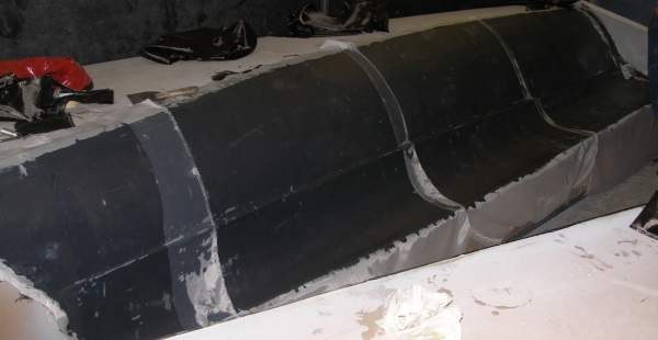 Peelply all over hull prior to vacuum bag