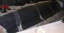 Peelply all over hull prior to vacuum bag