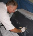 Sean removing bubbles and ensuring cloth is wetted