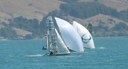 Fleet just around the top mark, Nuplex Davie Norris leads Meridian Energy
