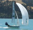 Akaroa sprints Meridian Energy (Tim Allan and Dave Pairman) to windward of Nuplex Davie kite run to finish