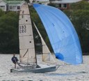 Mike Rhodes sailing Liquid singlehanded at Wakatipu Yacht Club