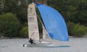 Mike Rhodes single handed at Wakatipu Yacht Club sailing Liquid